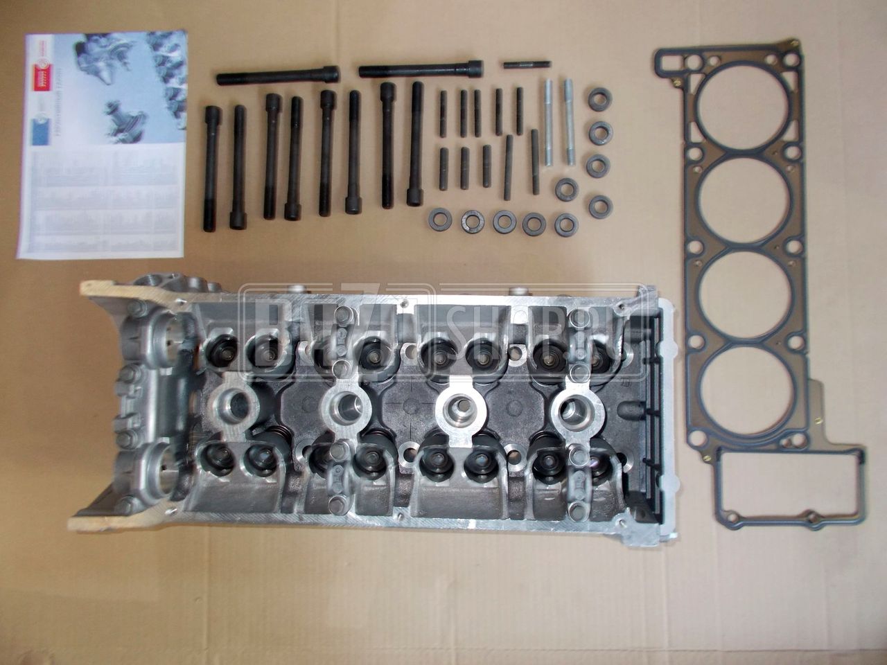 Головка  блока в сб.  УАЗ 40904, ГАЗ 40524, 40525 дв. (Евро-3)  трёхопорная, КОМПЛЕКТ "ЗМЗ" / 40624.3906562 (40624.1003007, с ДЛИННЫМИ болтами)