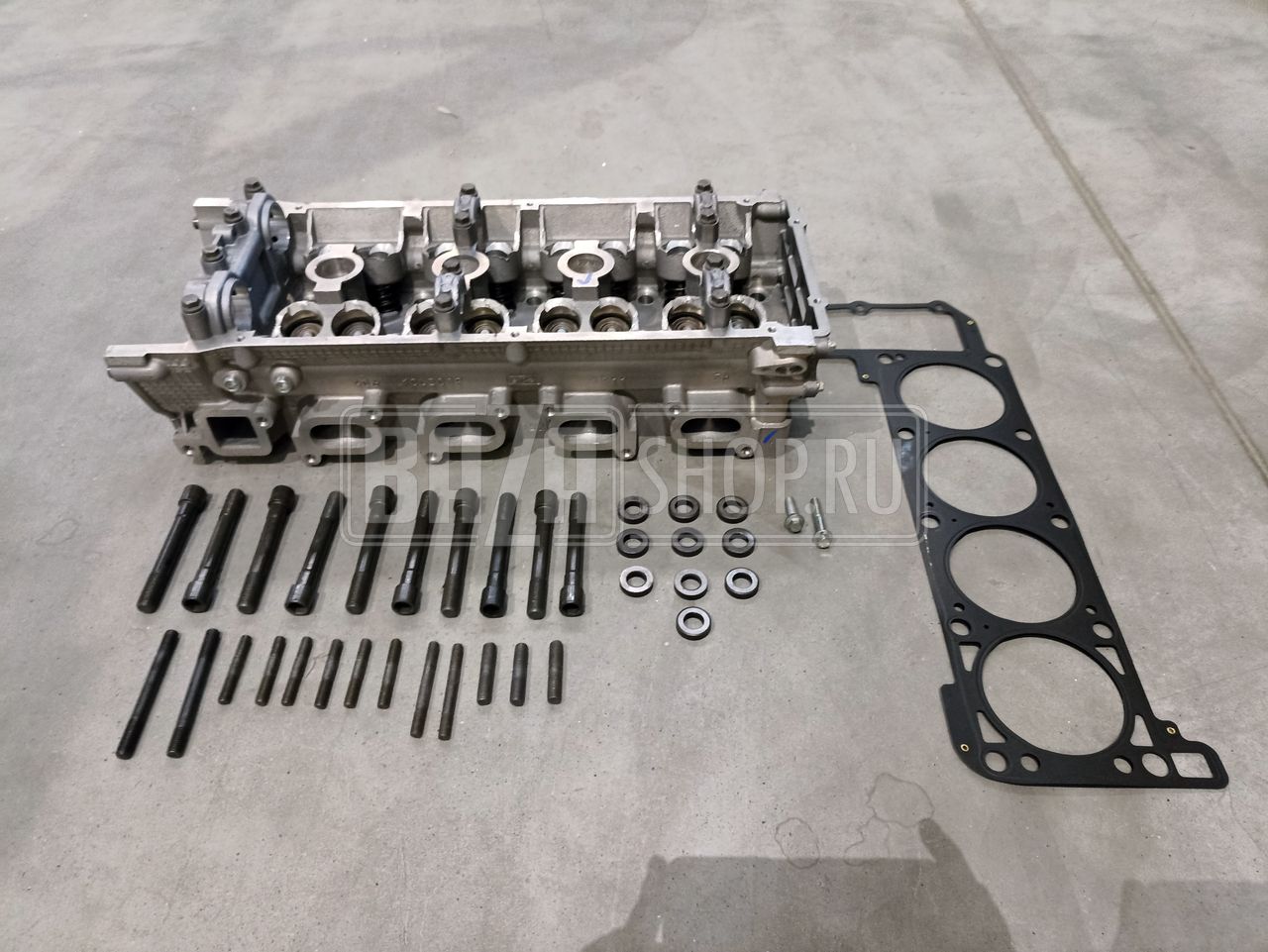 Головка  блока в сб.  УАЗ 409052 дв. (БЕЗ МОДЕРНИЗИР. СИСТЕМЫ ОХЛАЖДЕН.), трёхопорная КОМПЛЕКТ "ЗМЗ" / ## 409052.1063007